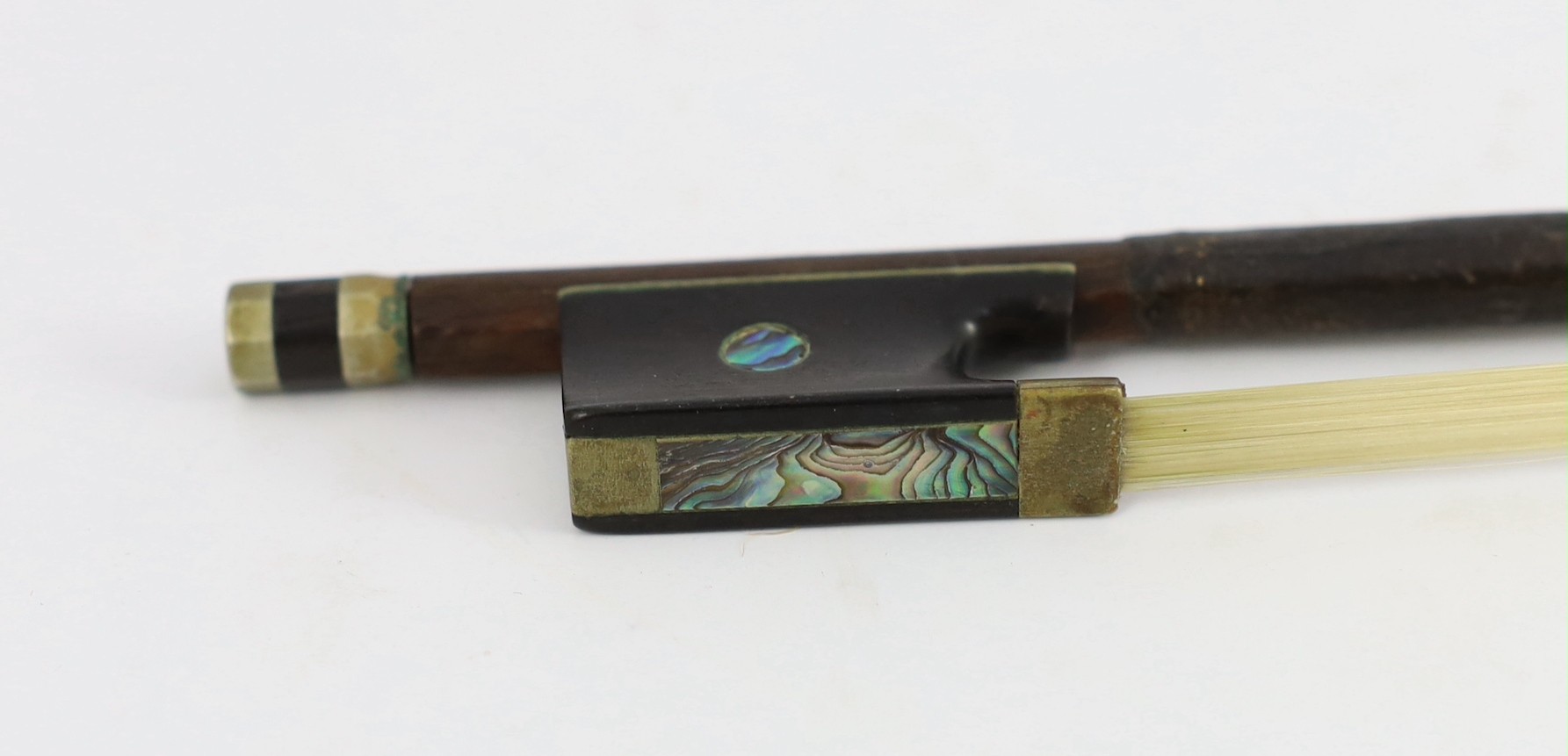 A silver mounted violin bow, stamped DODD, another stamped TOURTE and another bow